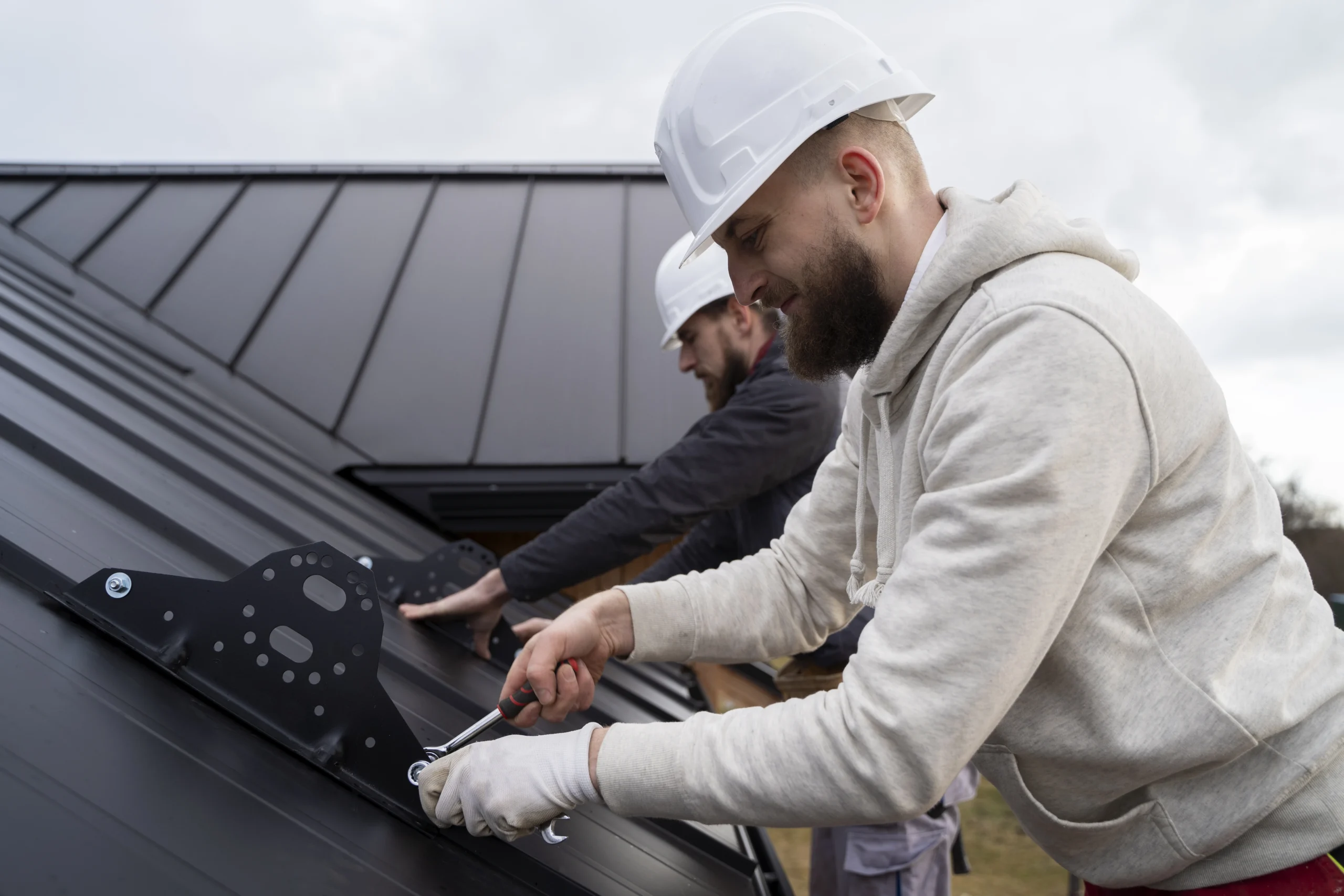 Workers installing a commercial roof